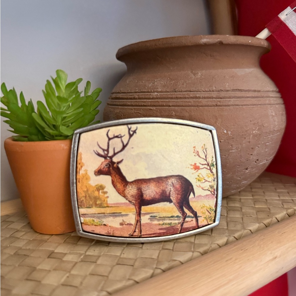 Vintage deer silver belt buckle.